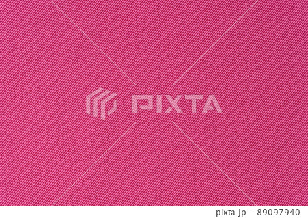 Red pink denim textile background closeup. Textile fabric with stitch structure 89097940