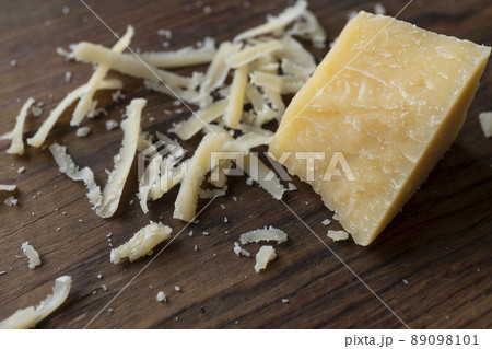 Close-up of a piece of parmesan 89098101