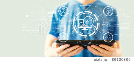 Marketing Strategy concept with man using a tablet Marketing Strategy concept with man using a tablet 89100306
