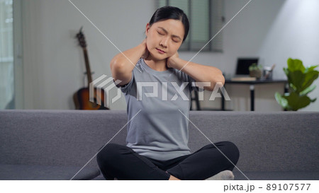Asian woman was sick with body pain. Asian woman was sick with body pain. 89107577