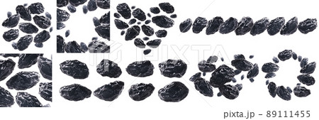 A set of photos. Dried prunes levitate on a white background 89111455