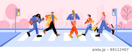 Different people walk on pedestrian crosswalk 89112407
