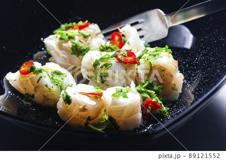 marinated sepia with parsley and chilli pepper filled with rice marinated sepia with parsley and chilli pepper filled with rice 89121552