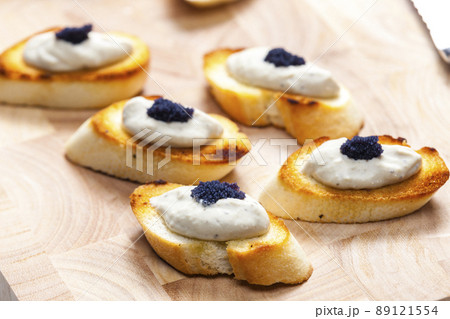 anchovy spread on toasted baguette slices anchovy spread on toasted baguette slices 89121554