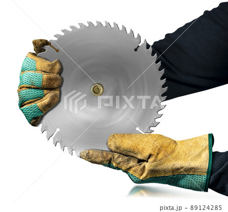 Gloved Hands Holding a Metal Circular Saw Blade Isolated on White Background 89124285