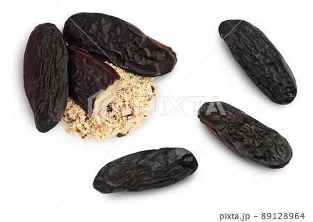 Tonka bean isolated on white background with clipping path and full depth of field. Bean of Dipteryx odorata, Top view. Flat lay 89128964