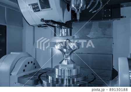 The five axis CNC milling machine cutting the metal gear part. 89130188