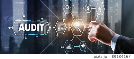 Audit. Checking the financial statements of the company. Businessman touching Audit on 3d icon on virtual screen Audit. Checking the financial statements of the company. Businessman touching Audit on 3d icon on virtual screen 89134167