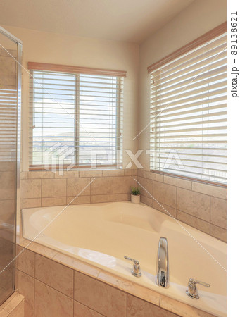 Vertical Corner bathtub and shower stall with ceramic tiles surround Vertical Corner bathtub and shower stall with ceramic tiles surround 89138621