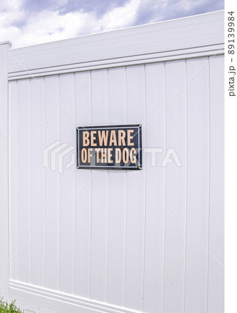 Vertical White vinyl fence gate with two beware of dog the signages Vertical White vinyl fence gate with two beware of dog the signages 89139984