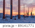 Winter industrial landscape. Morning view of power poles and port cranes. 89141771
