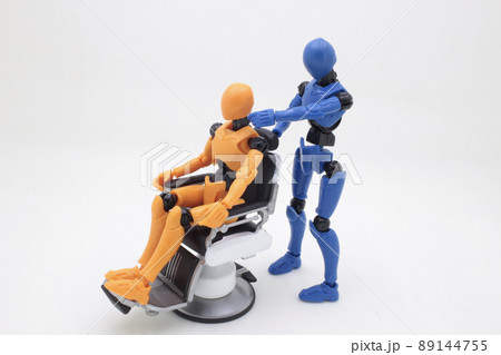 a figure having haircut at barber shop 89144755