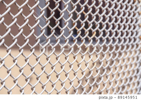 Chain link fence outside the building in San Francisco, California Chain link fence outside the building in San Francisco, California 89145951