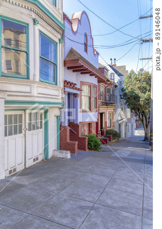 Row of townhouses on a sloped area at San Francisco, California Row of townhouses on a sloped area at San Francisco, California 89146048