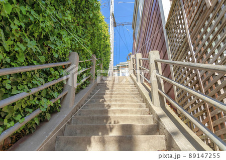 Outdoor concrete staircase with metal railings in a residential area at San Francisco, California 89147255