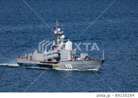Warship in the blue sea. A Russian torpedo bomber is moving across the sea at high speed. 89150284