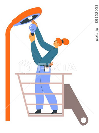 Electrician woman fixing lamp installing bulb Electrician woman fixing lamp installing bulb 89152053