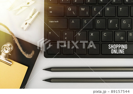 Hand writing sign Shopping Online. Business concept buying you want through internet website then deliver it Computer Keyboard And Symbol.Information Medium For Communication. 89157544