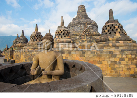 Buddha statue at buddhist temple Borobudur, Java, Indonesia 89158289