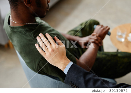 Psychotherapist Comforting Soldier 89159672