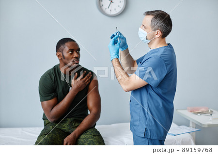 Soldier Getting Vaccine In Hospital 89159768
