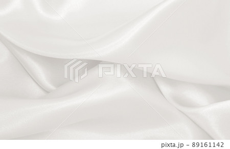 Smooth elegant golden silk or satin luxury cloth texture as wedding background. Luxurious background design. In Sepia toned. Retro style Smooth elegant golden silk or satin luxury cloth texture as wedding background. Luxurious background design. In Sepia toned. Retro style 89161142