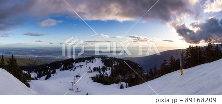 View of Top of Grouse Mountain Ski Resort with the City in the background. View of Top of Grouse Mountain Ski Resort with the City in the background. 89168209