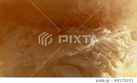 Macro shot of coffee mixing with milk. 89170101