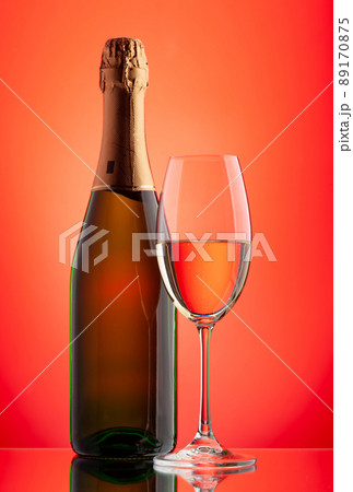 Champagne glass and bottle 89170875