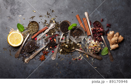 Various dried tea in wooden spoons Various dried tea in wooden spoons 89170946