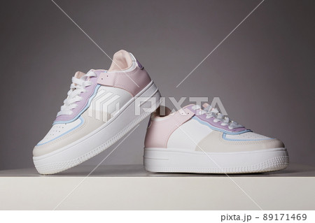 color trendy sneakers. fashion shoes still life 89171469
