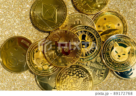 Golden crypto coins on a gold background. Bitcoin cryptocurrency with altcoins and shitcoins.  89172768
