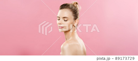 Skin Care Concept - Charming young caucasian woman with perfect makeup photo composition of brunette girl. Isolated on pink background with Copy Space. Skin Care Concept - Charming young caucasian woman with perfect makeup photo composition of brunette girl. Isolated on pink background with Copy Space. 89173729