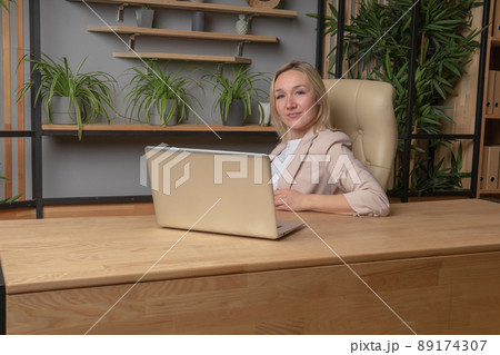 The girl at the computer business lady, the concept of a torgitologist gender equality job shopping freelance desktop online, from work laptop in using and adult internet, concept notebook. Tablet The girl at the computer business lady, the concept of a torgitologist gender equality job shopping freelance desktop online, from work laptop in using and adult internet, concept notebook. Tablet 89174307