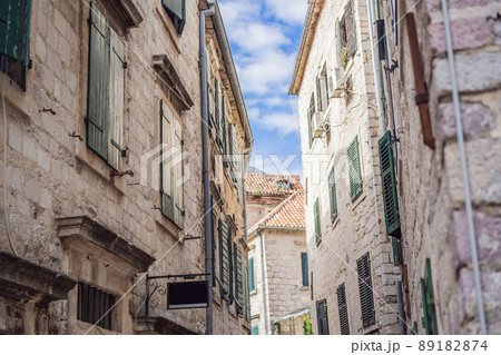 Colorful street in Old town of Kotor on a sunny day, Montenegro Colorful street in Old town of Kotor on a sunny day, Montenegro 89182874