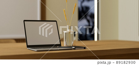 Modern comfortable workspace interior design with portable laptop Modern comfortable workspace interior design with portable laptop 89182930