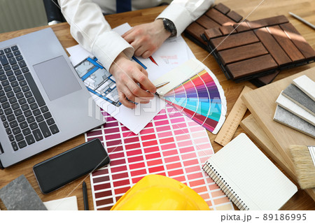 Interior designer working at project, palette on workplace 89186995