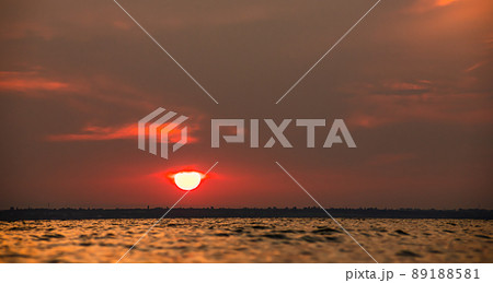 Beautiful red and orang sunset over the lake 89188581