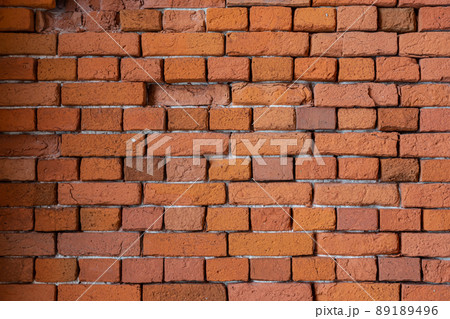 An old brick wall. Background for the photo. Background of stone wall texture photo An old brick wall. Background for the photo. Background of stone wall texture photo 89189496