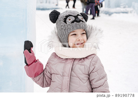 cute little caucasian girl with ice sculptures 89190778