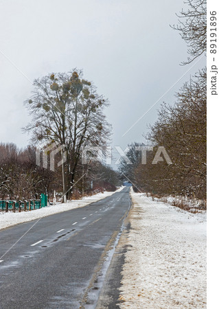 driving in winter after a snowfall, ice on the road, temperatures below zero driving in winter after a snowfall, ice on the road, temperatures below zero 89191896