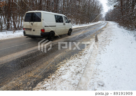 driving in winter after a snowfall, ice on the road, temperatures below zero driving in winter after a snowfall, ice on the road, temperatures below zero 89191909