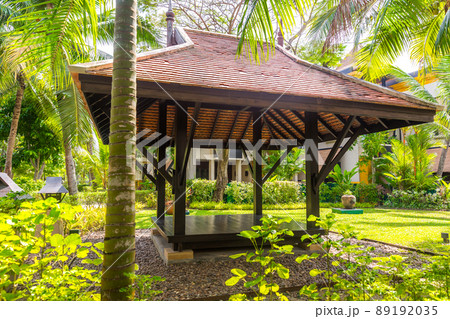 beautiful wooden gazebo in tropical nature in Thailand 89192035