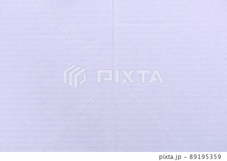 Textural background of white striped cardboard. 89195359