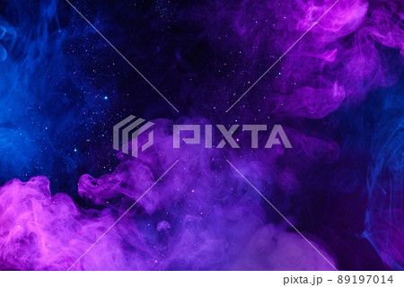 Shiny glitter particles in clouds of pink and blue colorful smoke abstract background Shiny glitter particles in clouds of pink and blue colorful smoke abstract background 89197014