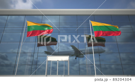 Landing airliner and flags of Lithuania in the airport terminal. 3D rendering Landing airliner and flags of Lithuania in the airport terminal. 3D rendering 89204304