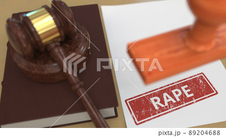 Gavel and RAPE stamp on the paper. Court related 3d rendering 89204688