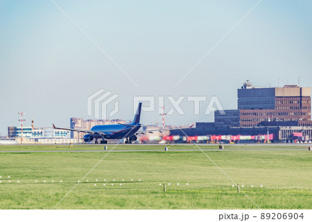 Passenger plane in the airport before the taking off. Passenger plane in the airport before the taking off. 89206904