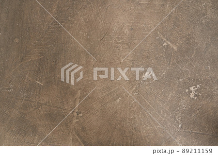 Seamless brown concrete texture. Stone wall background. Surface of the concrete old floor in scratches, which you can use as overlay in your design. High quality photo Seamless brown concrete texture. Stone wall background. Surface of the concrete old floor in scratches, which you can use as overlay in your design. High quality photo 89211159