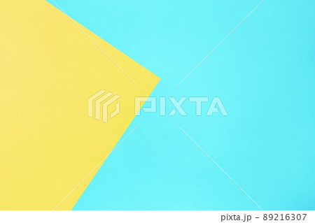 blue and yellow pastel color paper texture top view minimal flat lay background 89216307